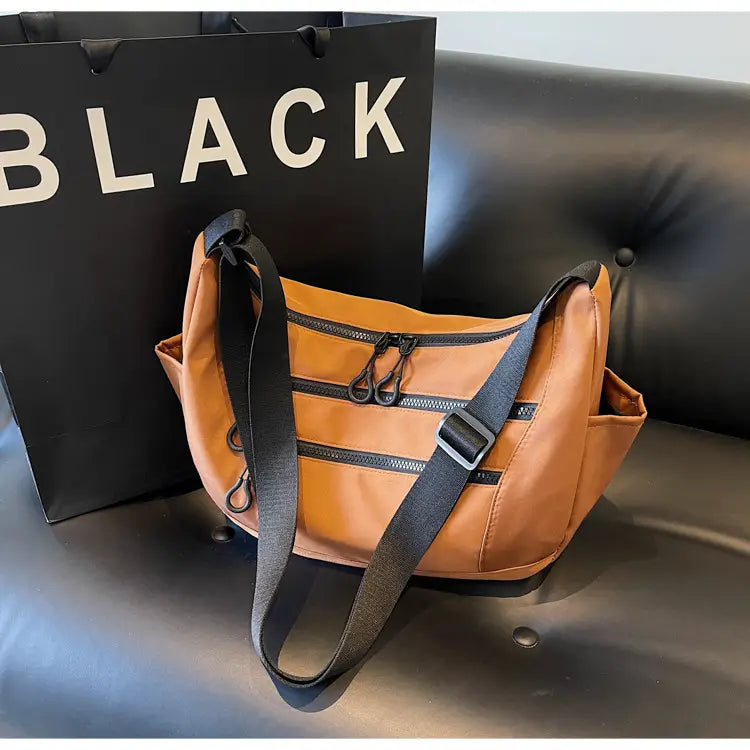 Lerret dumpling pose medium crossbody veske med glidelåslomme for kvinner