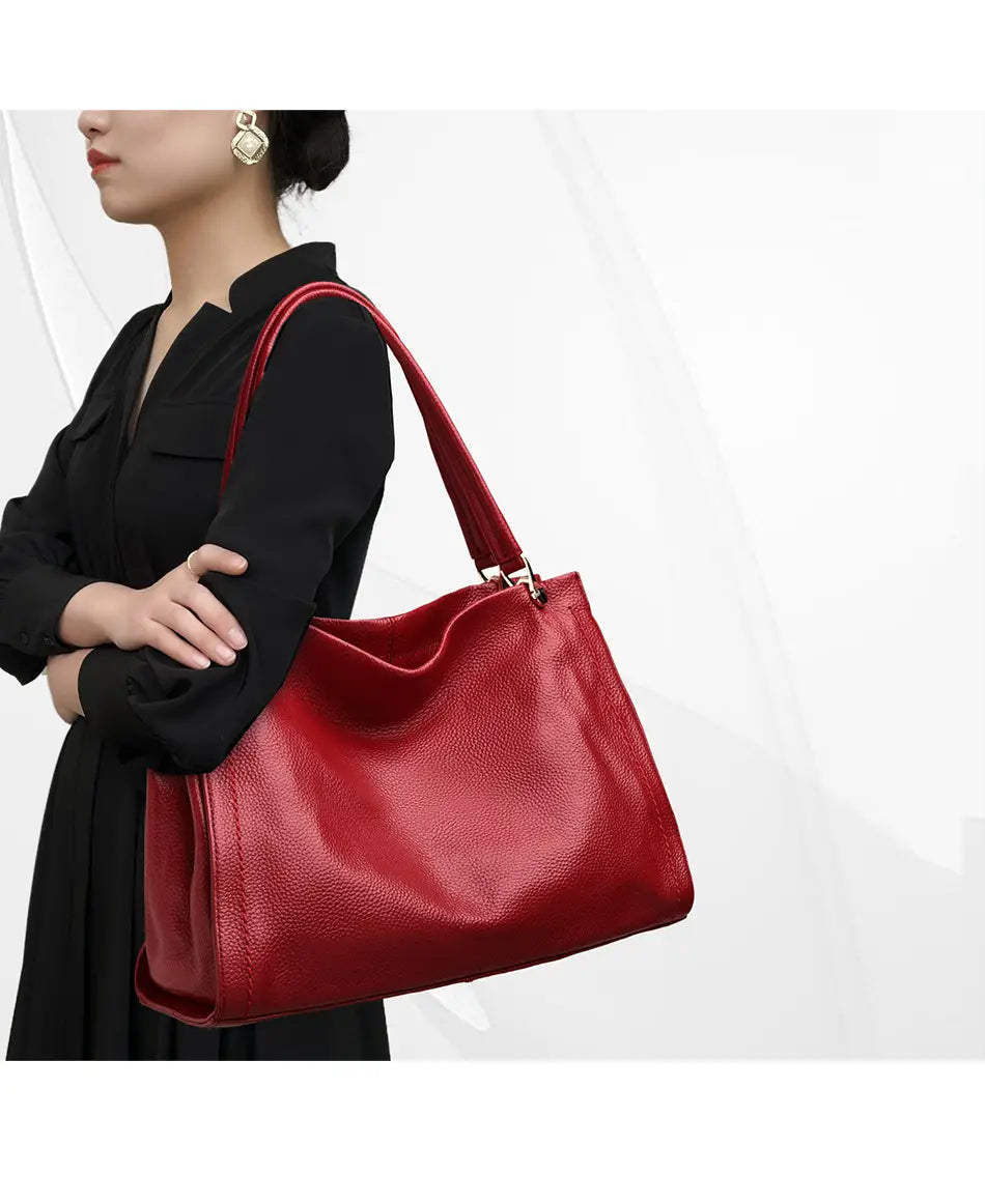 Simple Cowhide Leather Bag with Multiple Compartments and Adjustable Shoulder Strap