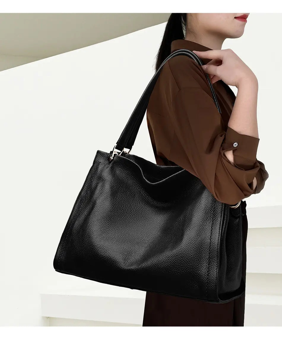 Simple Cowhide Leather Bag with Multiple Compartments and Adjustable Shoulder Strap