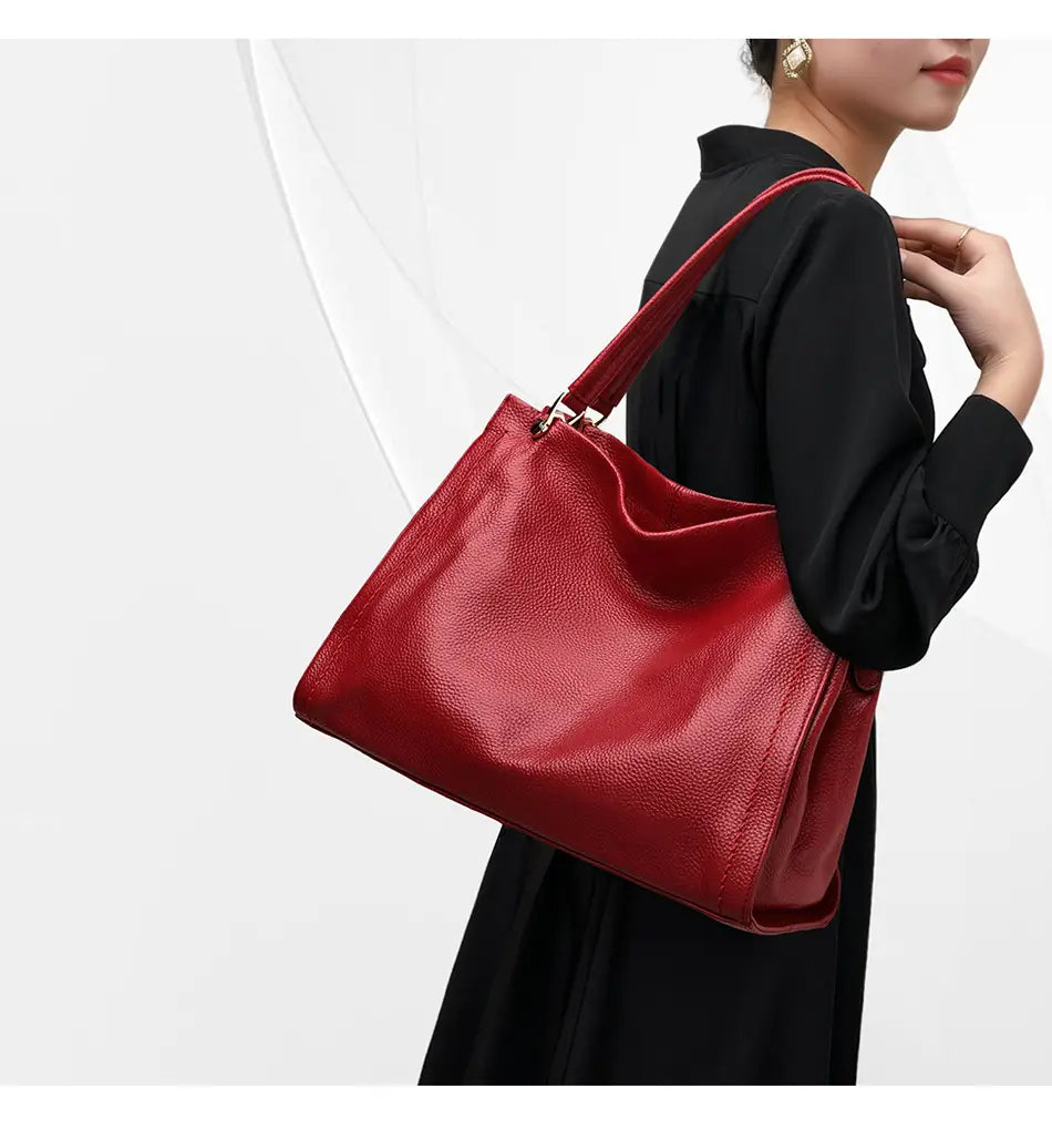 Simple Cowhide Leather Bag with Multiple Compartments and Adjustable Shoulder Strap