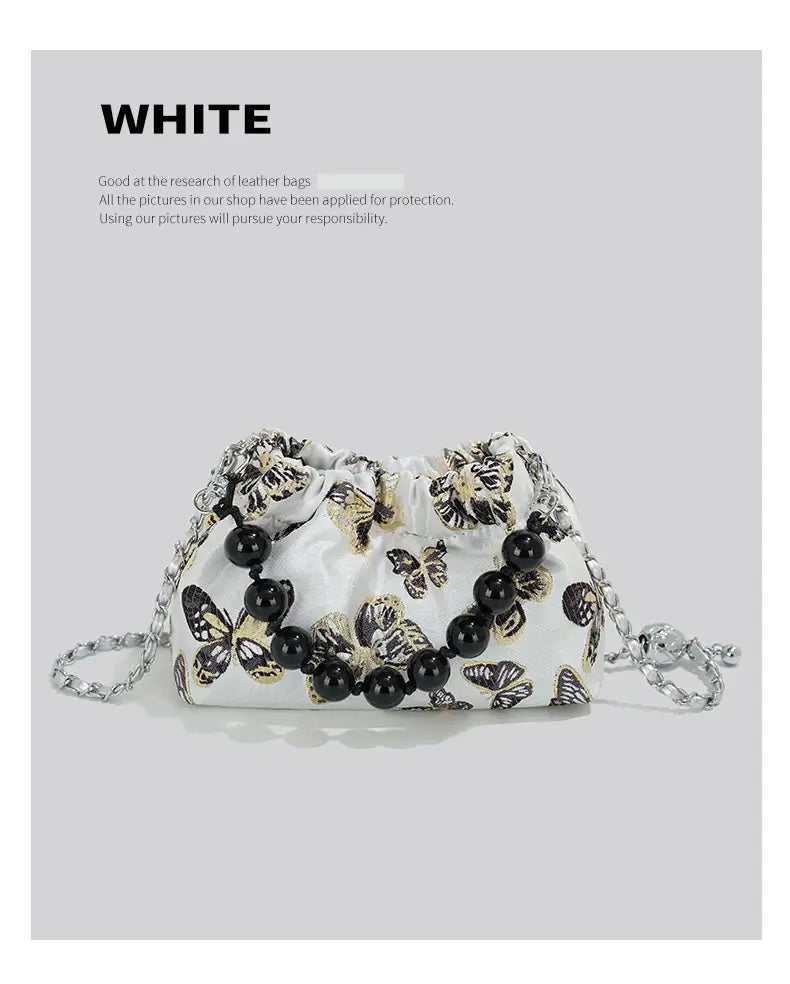 Pink Crossbody Bag with Bow Chain Buckets and Synthetic Leather Material