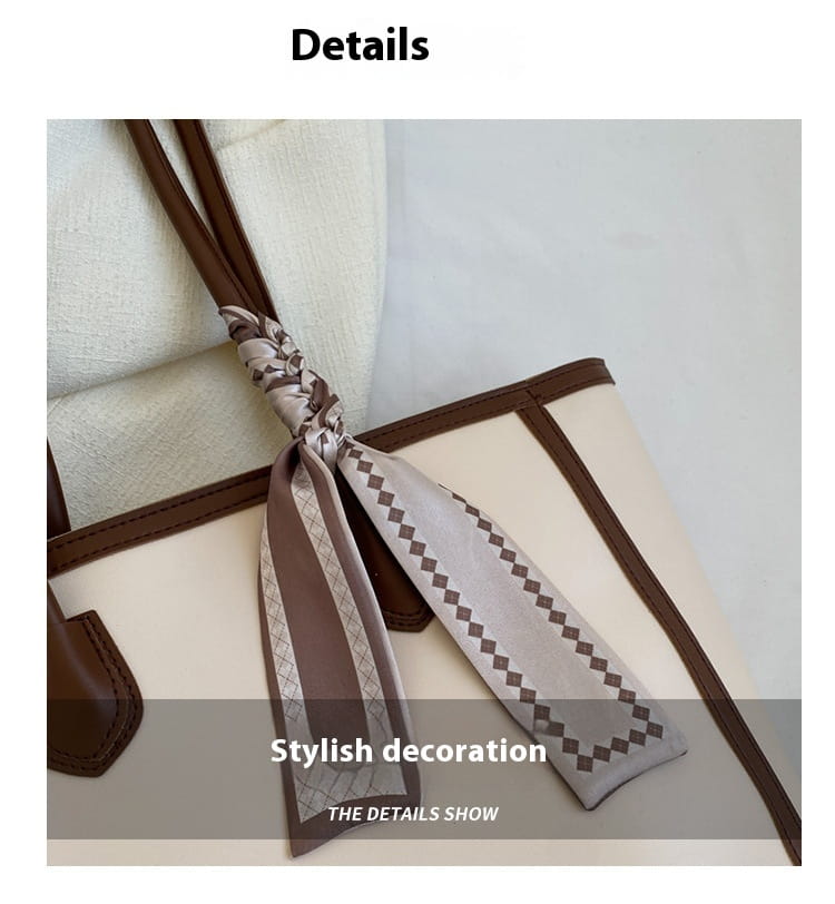 Czarna i brązowa skórzana torba na ramię z zewnętrznym kieszeni na zamek błyskawiczny