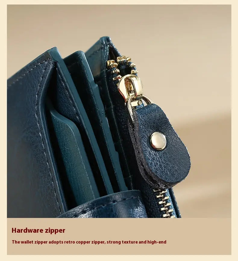 Sparán na mBan leathair gorm le sliotán cárta frith-ghoid agus líneáil poileistir