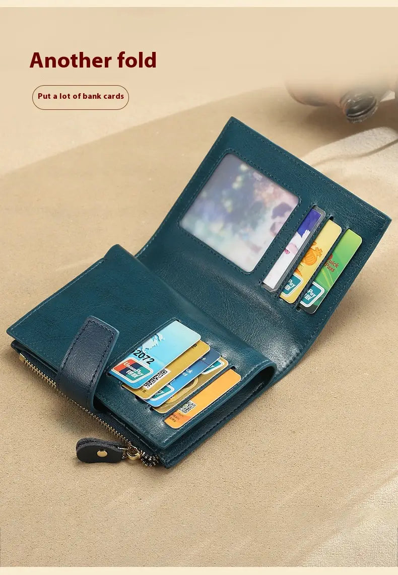 Sparán na mBan leathair gorm le sliotán cárta frith-ghoid agus líneáil poileistir