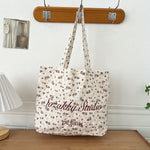 Black Apricot Miraflor Crossbody Bag with White and Red Letters for the United States - Teleplus united states chf