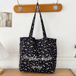 Black Apricot Miraflor Crossbody Bag with White and Red Letters for the United States - Teleplus united states chf