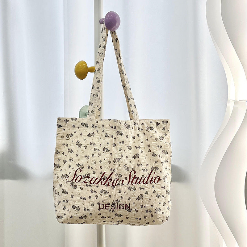 Black Apricot Miraflor Crossbody Bag with White and Red Letters for the United States - Teleplus united states chf