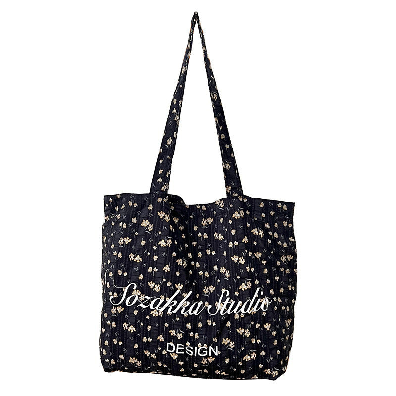 Black Apricot Miraflor Crossbody Bag with White and Red Letters for the United States - Teleplus united states chf