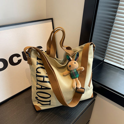 Canvas Shoulder Messenger Bag with Pendant in Multiple Colors - Teleplus canvas shoulder messenger bag