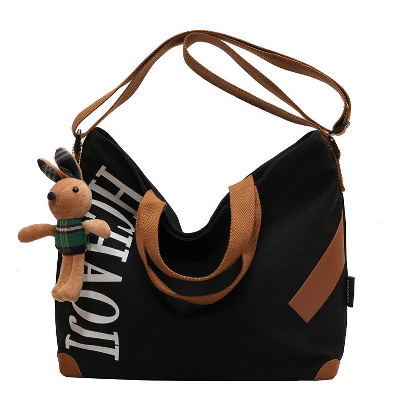 Canvas Shoulder Messenger Bag with Pendant in Multiple Colors - Teleplus canvas shoulder messenger bag