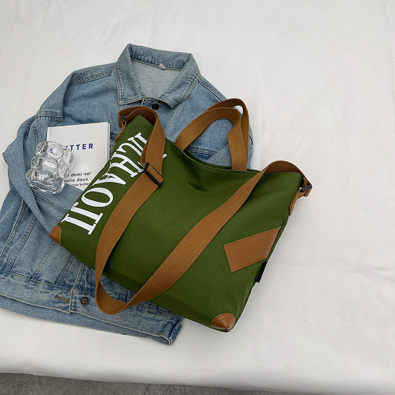 Canvas Shoulder Messenger Bag with Pendant in Multiple Colors - Teleplus canvas shoulder messenger bag