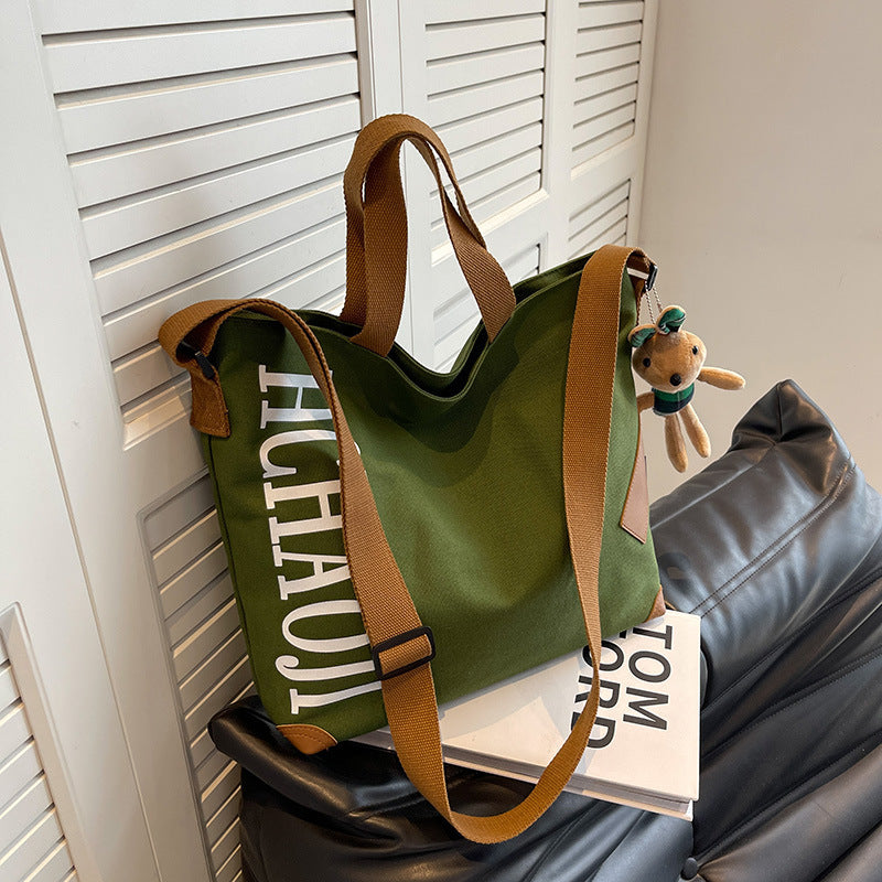 Canvas Shoulder Messenger Bag with Pendant in Multiple Colors - Teleplus canvas shoulder messenger bag