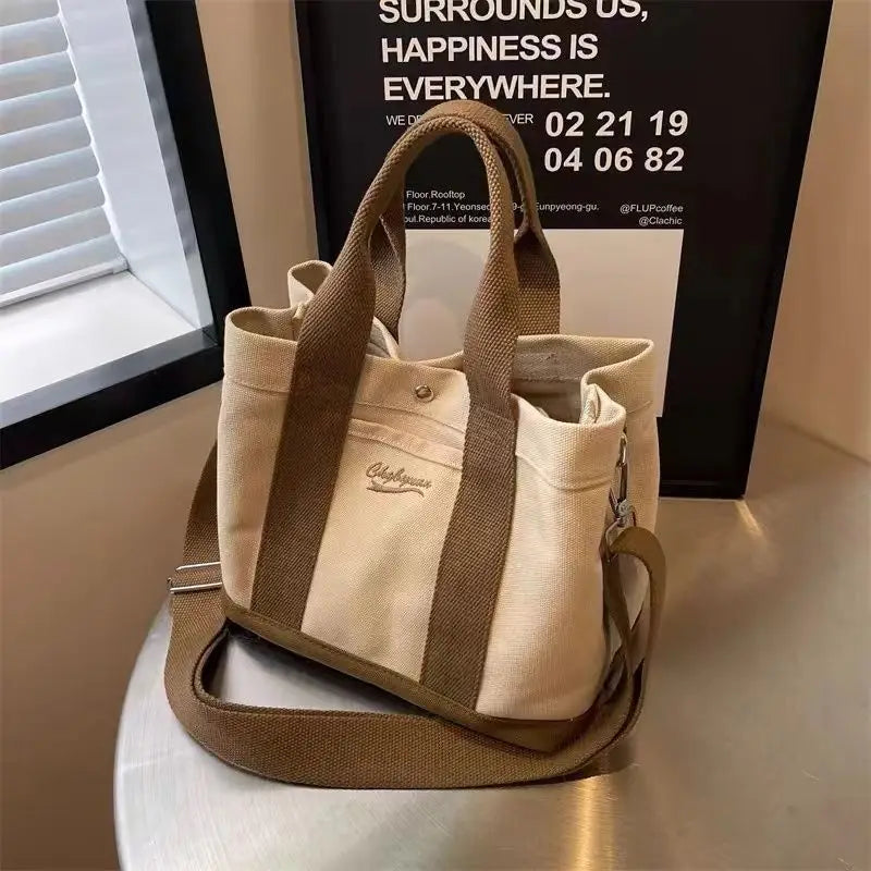 Sac de seau en toile beige avec conception d'épaule à fermeture éclair multiple de poches