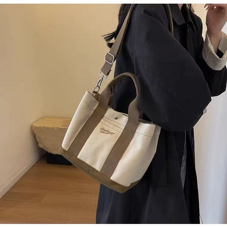 Sac de seau en toile beige avec conception d'épaule à fermeture éclair multiple de poches