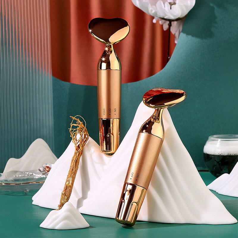 Electric Massage Instrument for Facial Skin Regeneration and Spa Treatments - Heart-Shaped Glowing electric massage