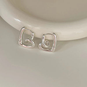 Silver Love Knot Ear Clips for Women in the United States CHF Chf Compatible - Tying Knots with Heart Earrings united
