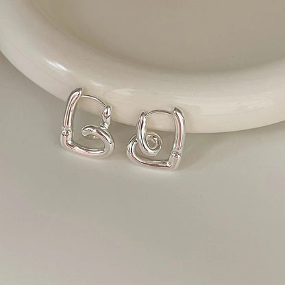 Silver Love Knot Ear Clips for Women in the United States CHF Chf Compatible - Tying Knots with Heart Earrings united