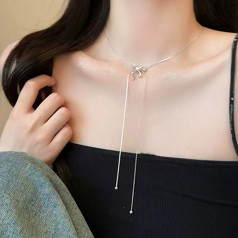 Electroplated Long Bow Tie Tassel Necklace with Snake Bones Chain - Pull for Women long bow tie tassel pull necklace
