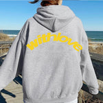 Gray oversized cotton blend hoodie with yellow text and front pocket for teenagers