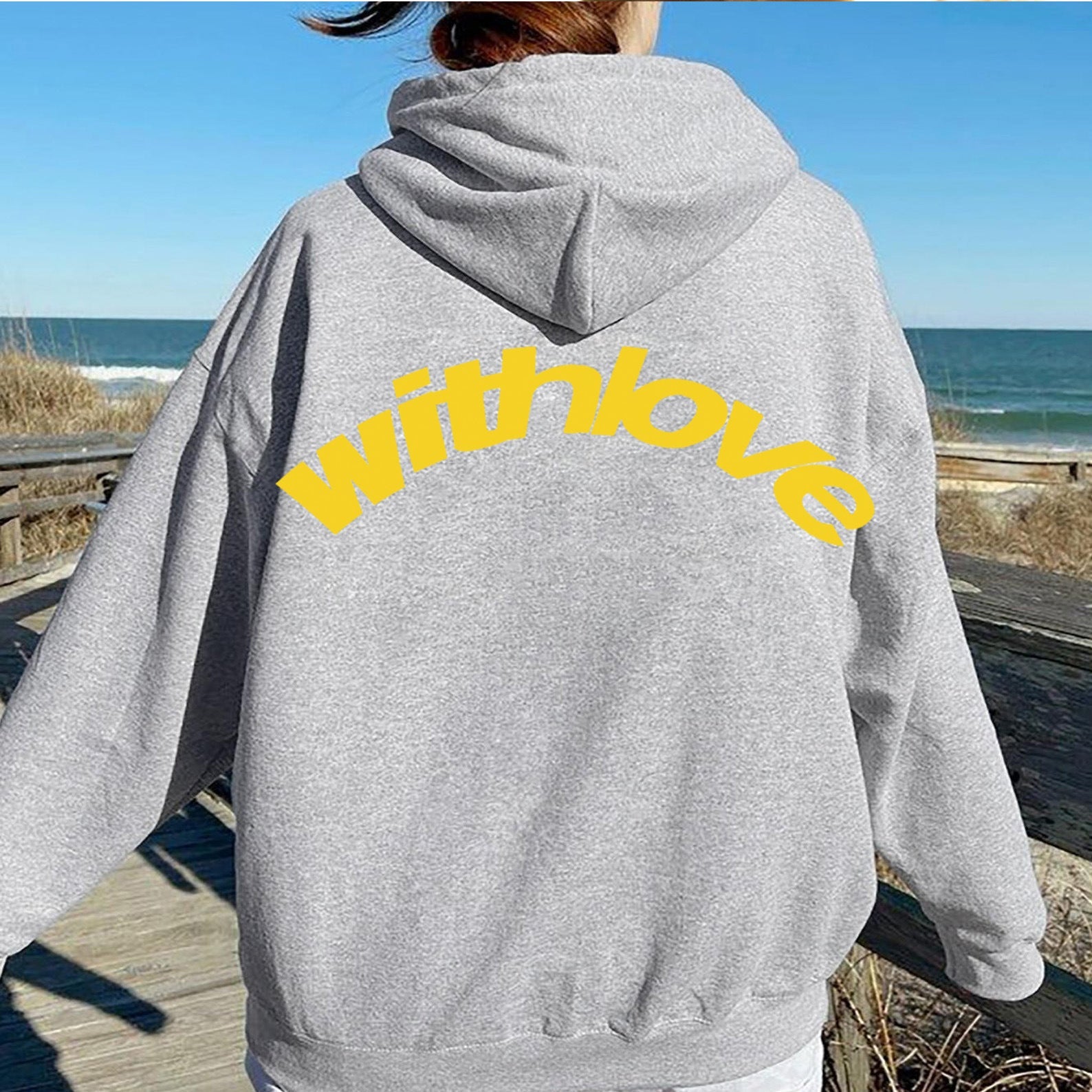 Gray oversized cotton blend hoodie with yellow text and front pocket for teenagers