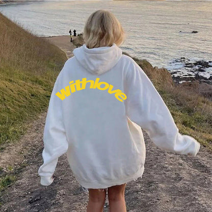 White oversized cotton blend men’s hoodie with pocket displaying withlove text for teenagers