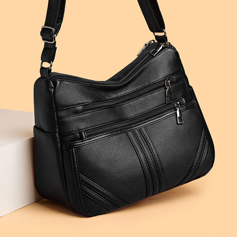 Textured Crossbody Bag with Soft Leather Finish and Multiple Pockets - Teleplus soft leather textured crossbody bag