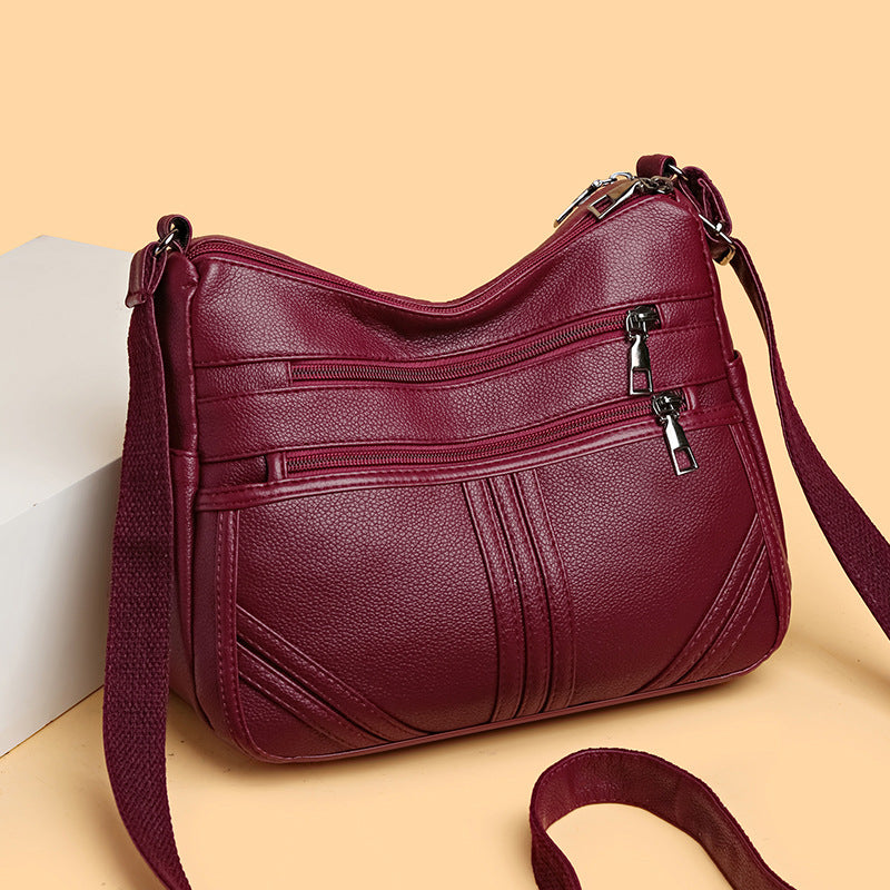 Textured Crossbody Bag with Soft Leather Finish and Multiple Pockets - Teleplus soft leather textured crossbody bag