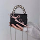 Textured Cute Bow Mini Chain Handbag with Interior Pocket and PU Outer Bag - Teleplus textured cute bow mini chain