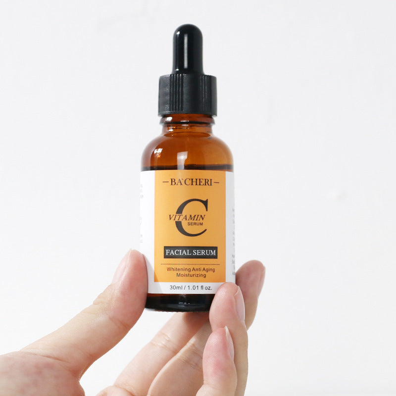 Vitamin C Brightening Serum Breaks Black Spots and Constrains Pores - While Your Glow vitamin c breaks brightens skin
