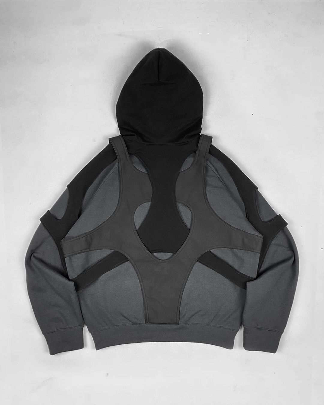 Gray and black hoodie with geometric cutouts from Womens Geometric Pattern Loose Fit Collection